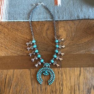 Faux turquoise squash blossom